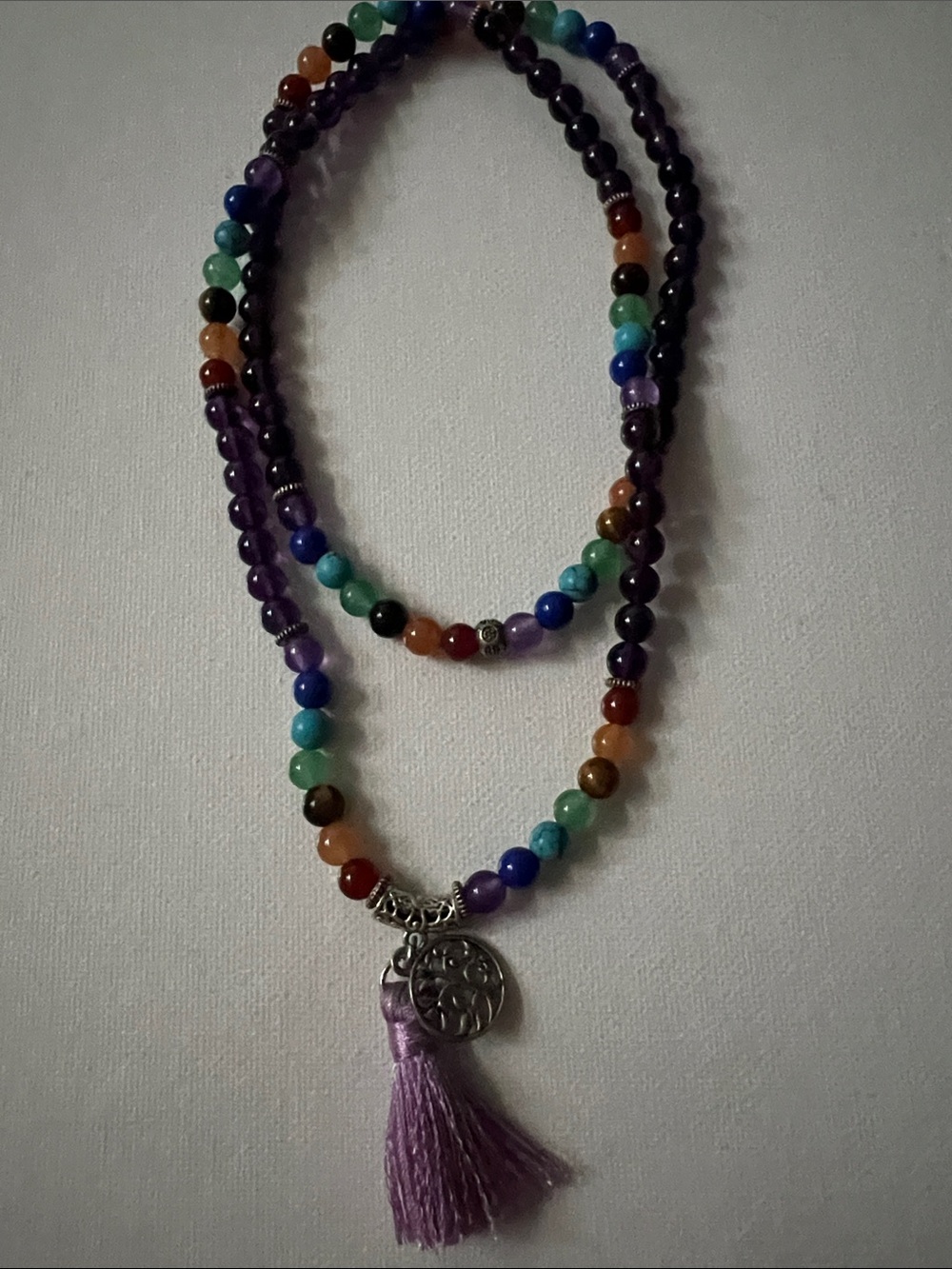 Multicolor Beaded Tassel Necklace with Purple Accents